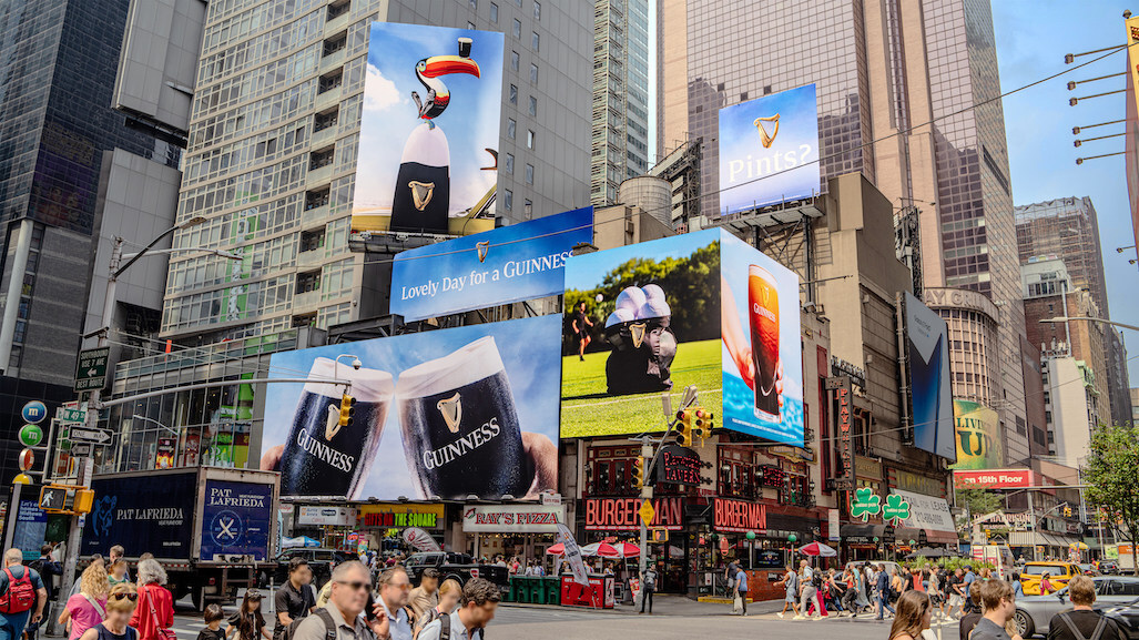 Old Times Square Corner Transformed into a Five-Display Brand Hub - The Times Square Pentacular featuring Guinness | Credit of Heritage Outdoor Media Times Square - The Pentacular