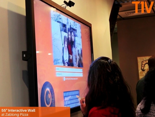 Projects: Charlotte Pizza Joint Uses Interactive To Engage Waiting Customers