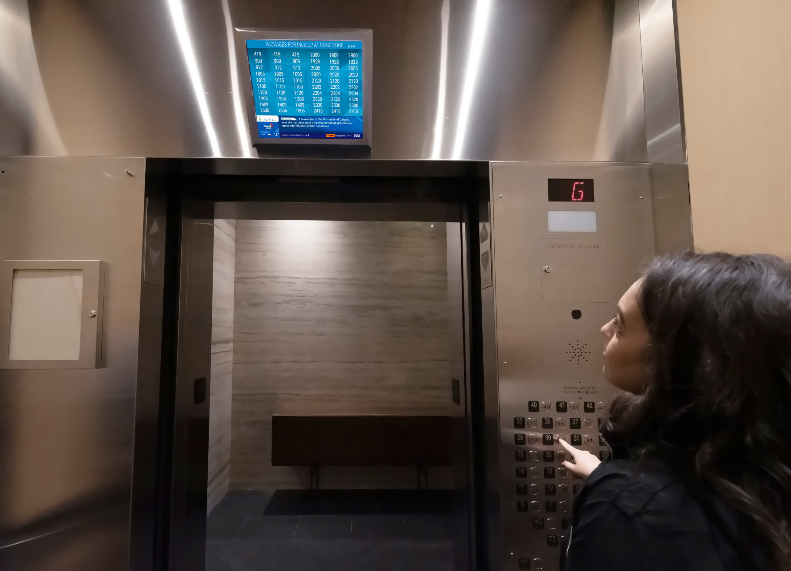 New Content Partnership Puts Tenant Notices On High-Rise Elevator Screens