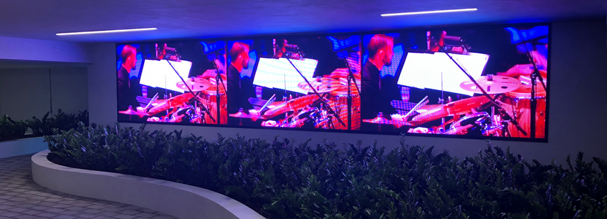 South Beach Condo Complex Adds 29-Foot LED Wall … To Parking Garage Lobby