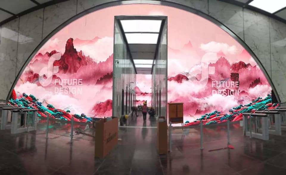Giant Arched LED Video Wall Greets Workers, Visitors At SW China Office Tower