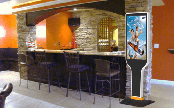 A Kiosk Screen Stand Shaped Like A Longneck Beer Bottle