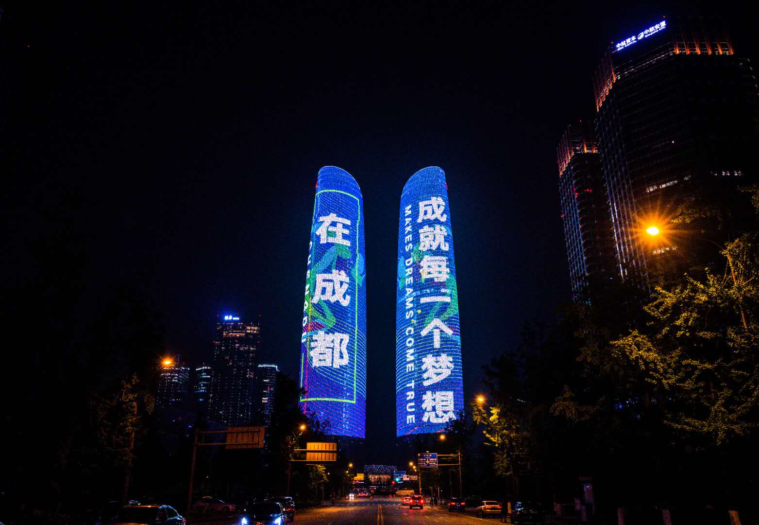 Twin 58-Floor Office Towers In China Are Godzilla-Size LED Billboards At Night