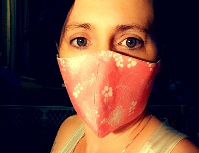 This Hero Doesn’t Wear A Mask, She Makes Them