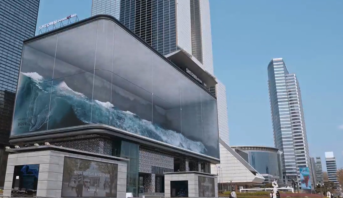 This Fantastic Sloshing Virtual Wave Looms Over A Seoul Shopping District