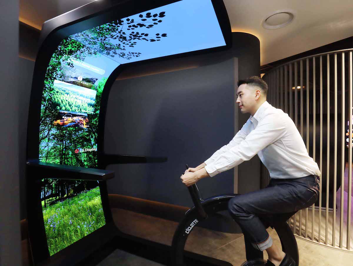 LG’s OLED Demos At CES Include OLED Canopy For Spin Bike Set-Up