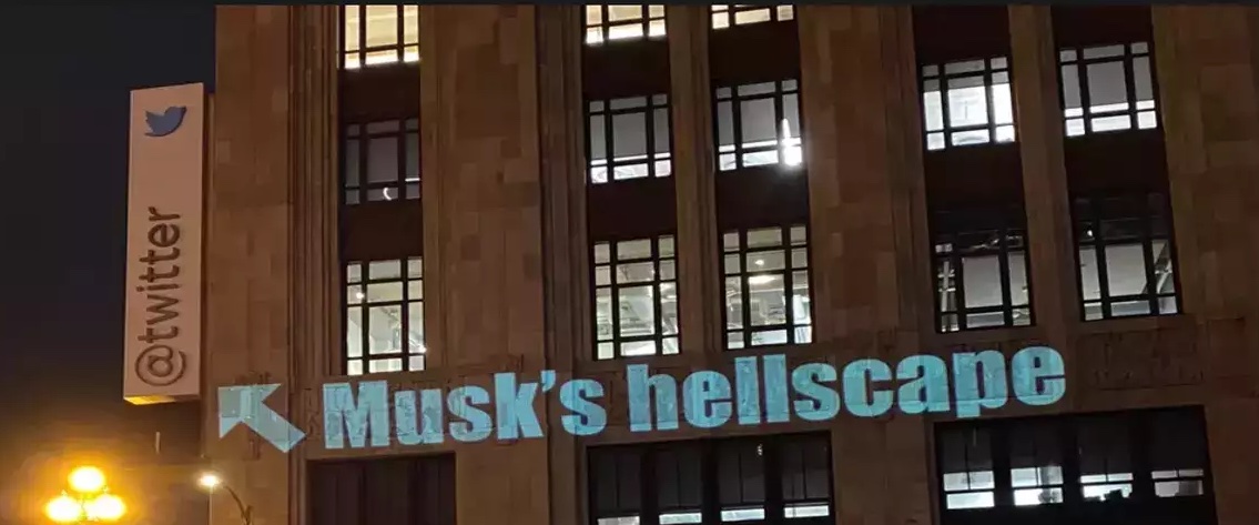 Activist Projection-Maps “Musk’s Hellscape” On Twitter Office Block