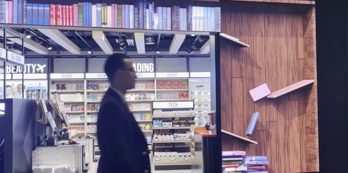 Books Tumble Off Shelf On This Great LED Retail Facade At Qatar’s Flashy New Airport