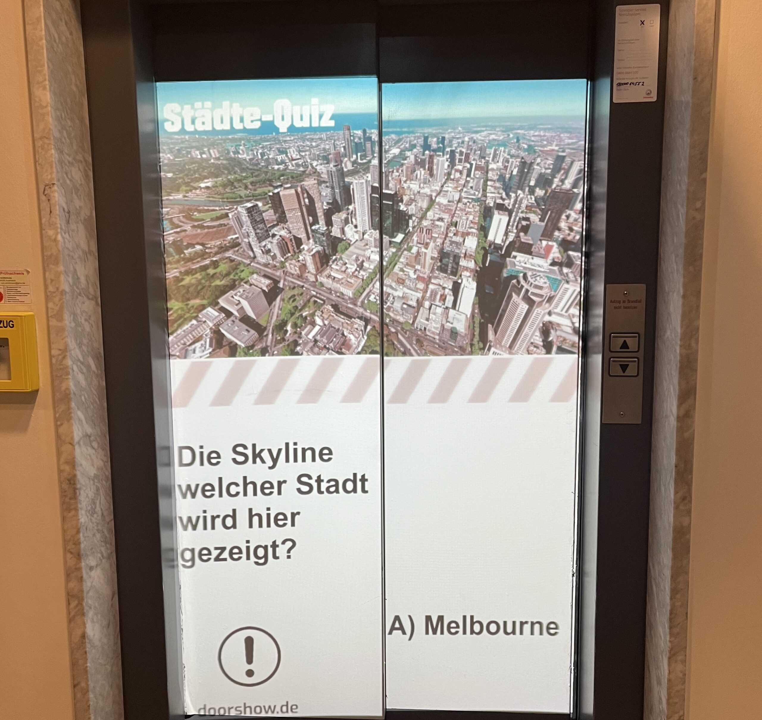 Elevator Giant Schindler’s Media Network Also Has Projected Ads On Lift Doors