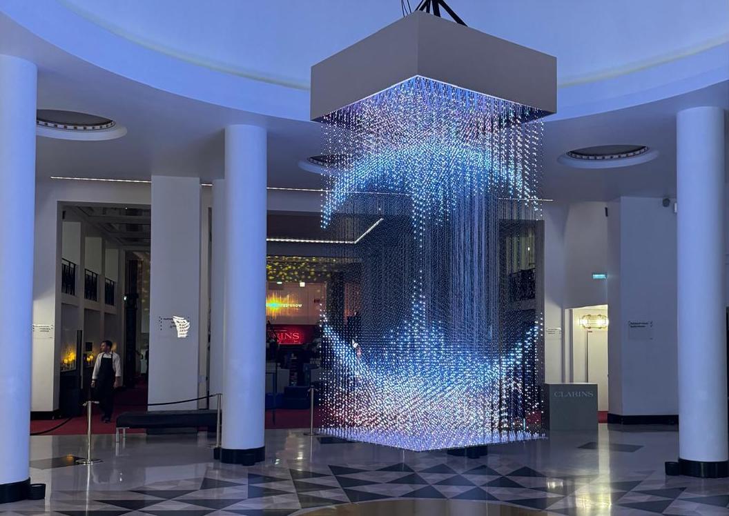 LED Curtain Creates Ambient Three-Dimensional Low-Rez Visuals In Paris Concert Hall Lobby