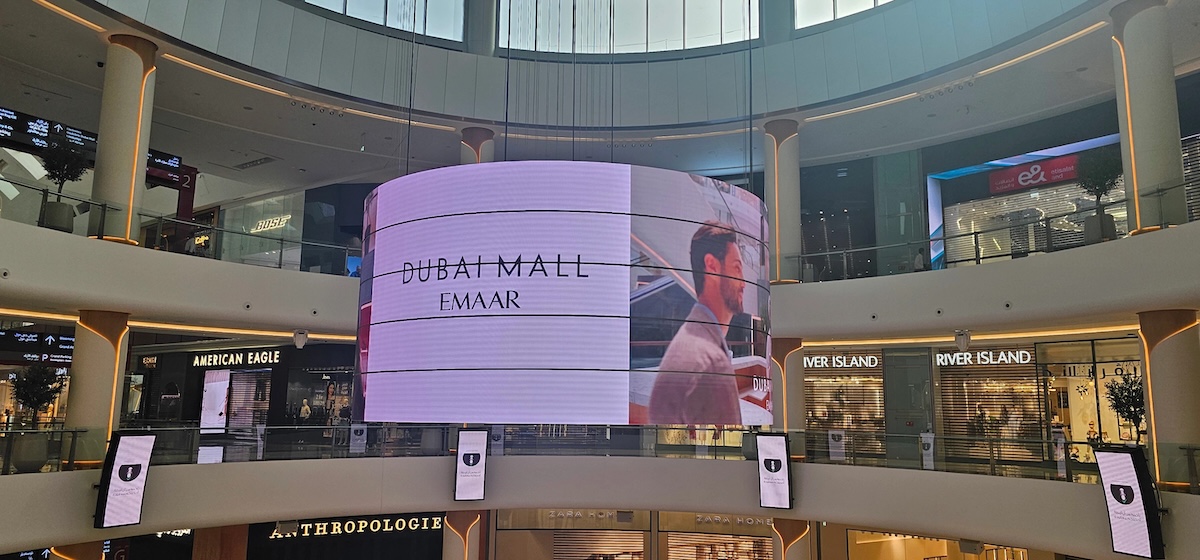 Dubai Mall Adds Shape-Shifting LED Halo Rings To Busy Atrium Area