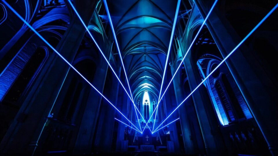 Dynamic lighting sequences, create an atmosphere where spiritual tradition meets digital artistry