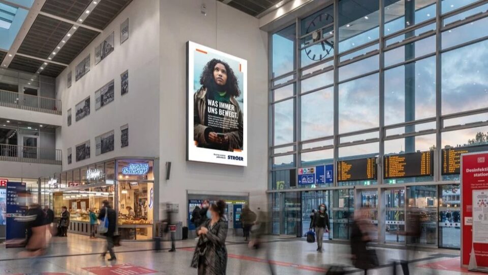 Ströer’s large digital billboard towers over a mixed-use district in Münster, Germany